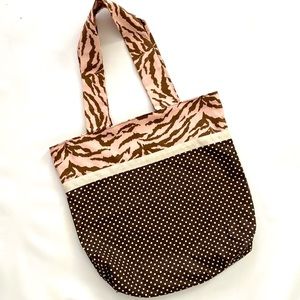 Hand-crafted tote from recycled fabric.